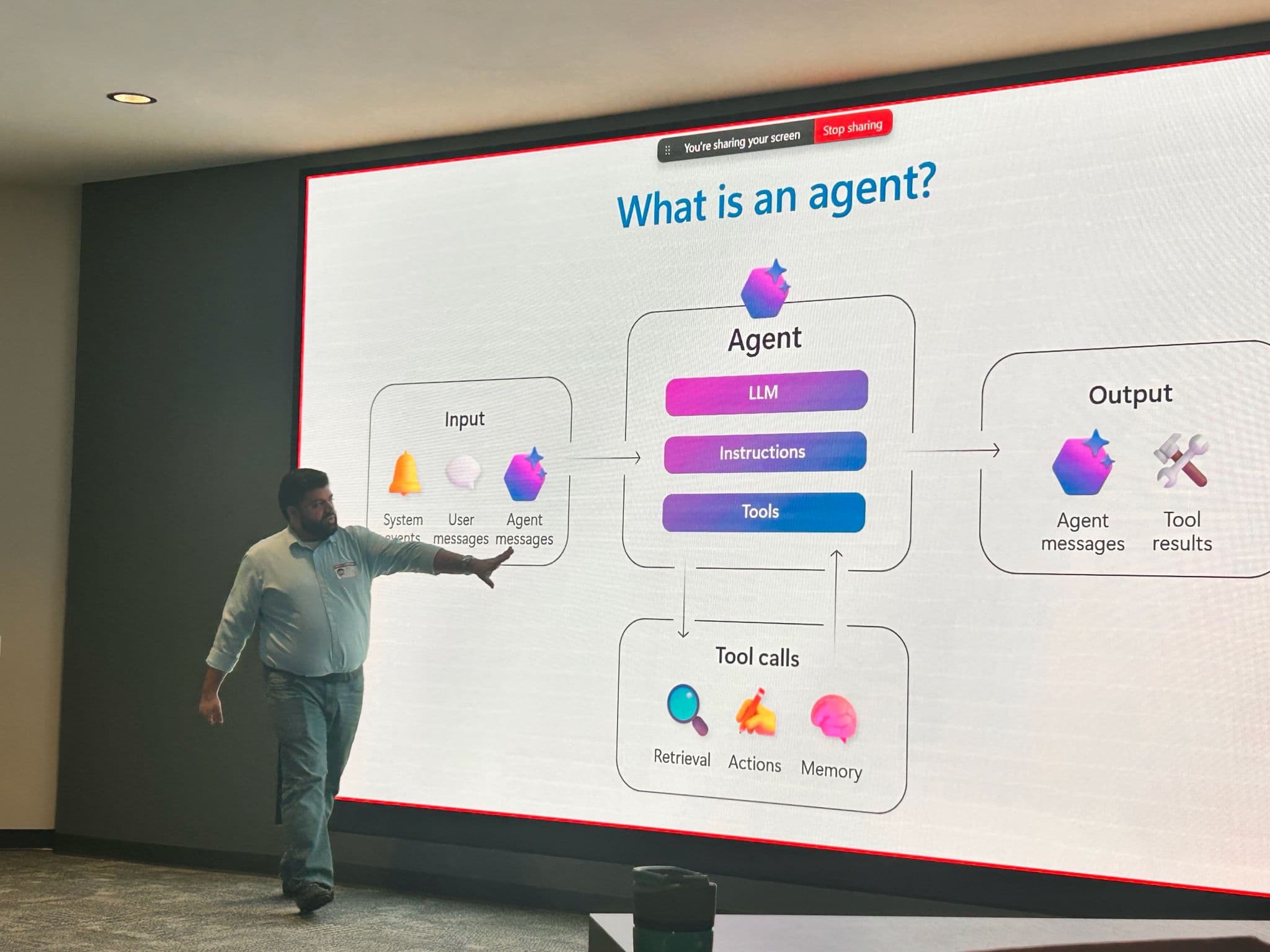 Zohaib Khawaja presenting an AI agents talk on stage